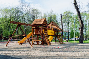 Playground fenced with tape to prevent access due to the coronavirus epidemic