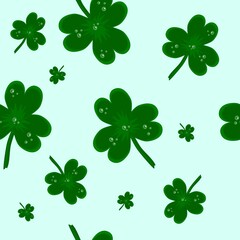 St. Patrick's Day, a pattern of green shamrocks of different sizes on a light green background. Background for textile and paper.