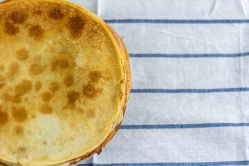 Homemade baked pancakes on the table.Pancake day.Top view.