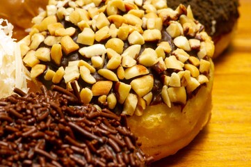 A peanut sprinkled donut in shallow focus