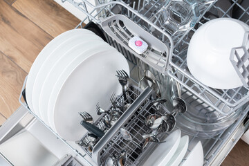 Soap tablet of a detergent for washing dishes in dishwashing machine. 