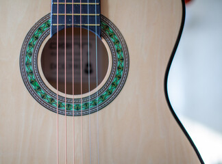 Close-up of a guitar player or a person learning to play the guitar.