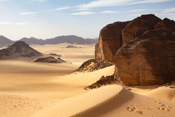 Fototapeta na wymiar Sandy rocks in Sahara desert, Algeria desert