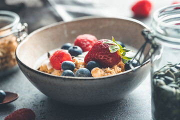 Healthy breakfast, cereal with berries and yogurt