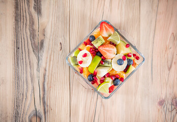 Portion fruit salad in a bowl . Healthy meal