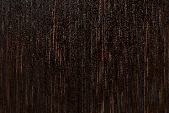background of dark brown, wooden flooring, top view
