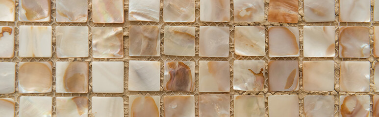 background of small nacreous tiles, top view, banner