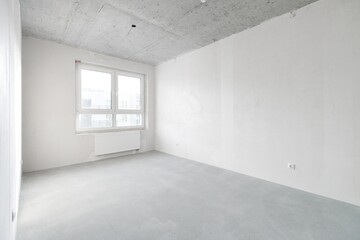 interior of the apartment without decoration in gray colors. rough finish