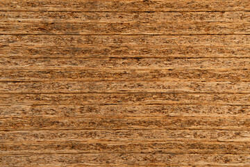 background of natural, stacked pressed wood sheets