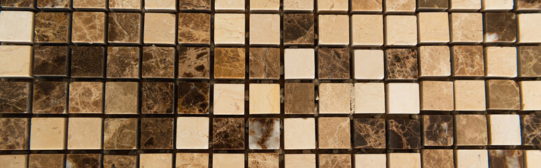 beige and brown marble tiles background, top view, banner