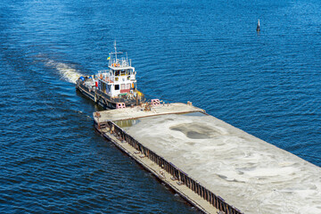 Towboat with big platform on Dnypro river in Kyiv, Ukraine on August 30, 2020. 