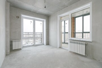 interior of the apartment without decoration in gray colors. rough finish