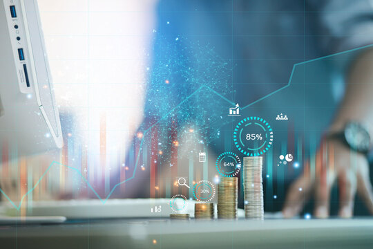 A male businessman looks at the financial trading business by looking at an overview of the holographic income chart and the future of capital uncles from the impact of the economic market.