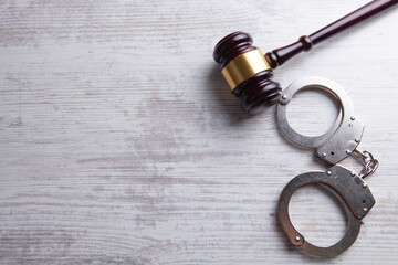 Legal law concept image - gavel and handcuffs