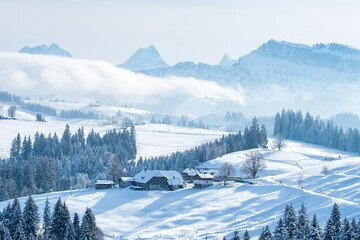 view over the snowy hills of Emmental near Bumbach
