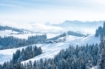 view over the snowy hills of Emmental near Bumbach