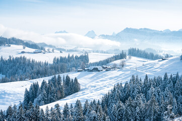 view over the snowy hills of Emmental near Bumbach