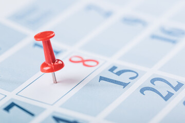 calendar and marked the date the red pushpin