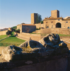 Tuscania,  Viterbo. Etruscan' sarcophagus toward Torre di Lavello from Piazza Basile.