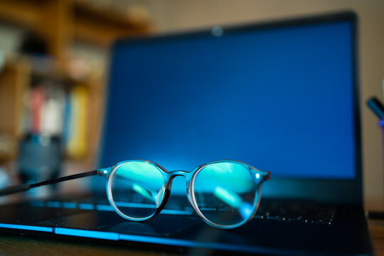 Eyeglasses with blue light filter can protect your eyes from screens.