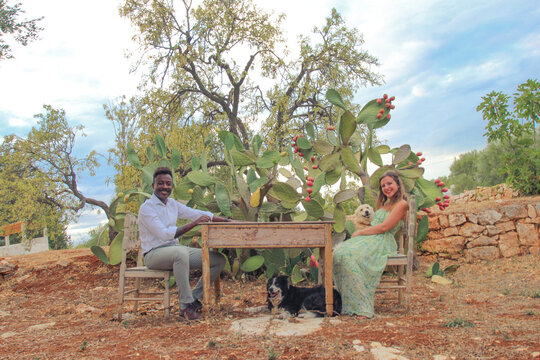 Beautiful Millennial Couple Taking A Family Photo With Their Two Dogs, Overjoyed Biracial Family With Dogs Taking A Photo, Happy Multiethnic Family Spending Time Together 