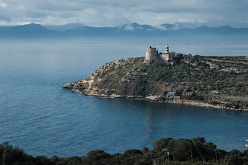 Fototapeta na wymiar Lighthouse tower of Capo Sant'Elia, Cagliari - South Sardinia.