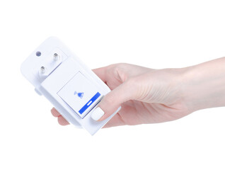 Wireless electrical doorbell in hand on white background isolation