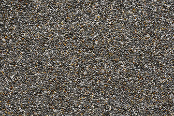 chia seeds background, close up view from above