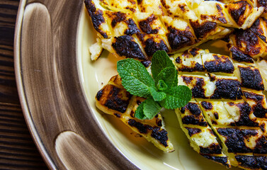Traditional cottage cheese casserole with mint on a beautiful background