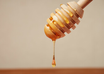 Close-up of delicious pancakes, with fresh blueberries, strawberries and maple syrup on a light background. With space to copy. Sweet maple syrup flows from a stack of pancakes