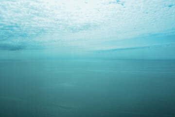 Turquoise sea panorama. Sea and clouds. Warm summer day. Travel and Vacation