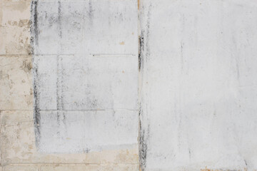 Old white plaster on the wall 