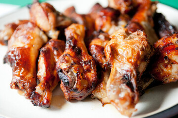 bbq chicken wings and sauce, grilled and tasty finger food