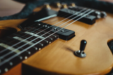 Fototapeta na wymiar Close up gibson electric guitar, les Paul special model natural finish, P90 pickup.