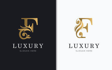 Luxury letter F with gold color logo template
