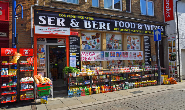 Grocery  Store With Produce Outside On Street.