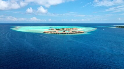 A bird's eye view of a luxury ocean resort in the Maldives. The concept of a luxury vacation, a honeymoon on a tropical island