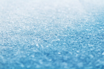 Background from fresh winter snow. Selective focus.