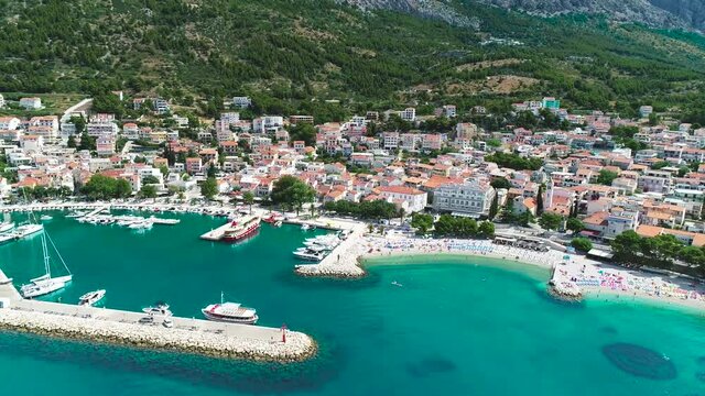 Baska Voda beach and waterfront aerial view, Makarska riviera in Dalmatia, Croatia