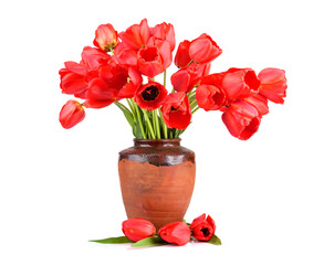 Vintage jug with red tulips