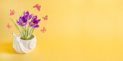 Greeting card banner, composition with snail and flowers on yellow background with copy space