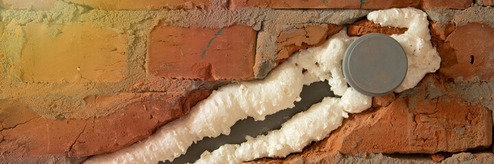 pipes in isolation are fixed by mounting foam