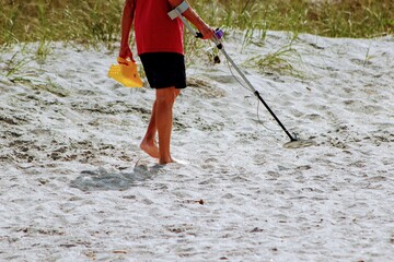 man metal detecting