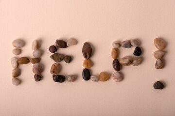 help written with beach stones