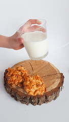 State of milk with cookies on a white background. High quality photo