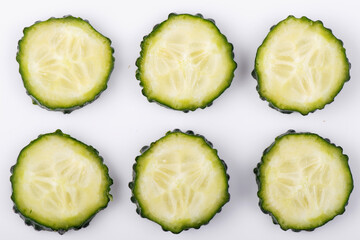 Sliced cucumber isolated on white background