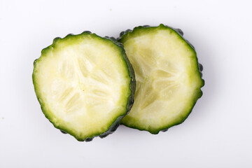 Sliced cucumber isolated on white background