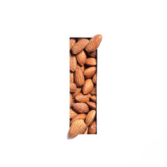 Nuts alphabet. Letter I made of natural almonds and paper cut isolated on white. Typeface and healthy food