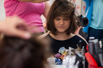 Portrait of young girl in hair salon