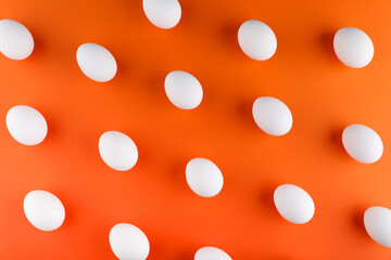 pattern with eggs on orange background